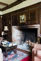 The winter parlour with oak panelling added in 1609, Cothay Manor