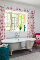 Patterned curtains in bathroom