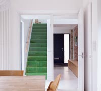 Green carpet on staircase