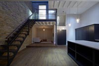 Open plan kitchen and staircase