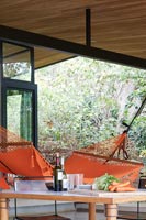 Covered patio area with hammock