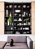 Accessories on black shelves