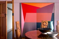 Colourful painting in dining room