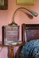 Edwardian scalloped lamp on bedside table