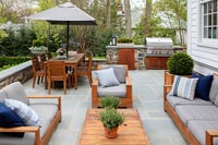 Modern patio with wooden furniture