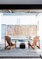 Wooden chairs on patio
