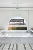 Marble bathtub with shower