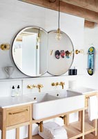 Bathroom sinks with wooden cabinets
