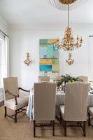 Ornate chandelier above dining table