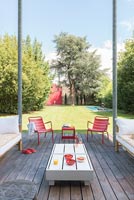 Deck with colourful furniture