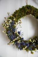 Wreath of moss and Sea holly flowers