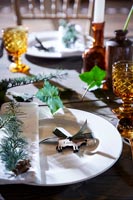 Detail of place settings on a decorated table