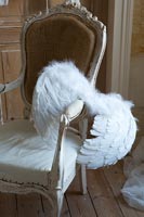 Detail of chair with angel wings