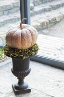 Detail of pumpkin on an urn
