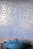 Detail of ornamental tile kitchen splashback
