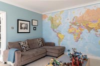 Playroom with world map wallpaper