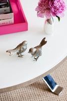 Detail of bird ornaments on table