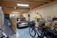 Garage with car and bicycles 