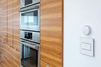 Modern kitchen cabinets with integrated oven 