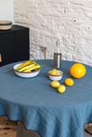 Fruit on small circular dining table 