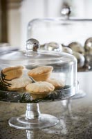 Mince pies in decorative covered cake stand  