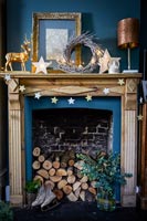 Wooden mantelpiece decorated for Christmas 