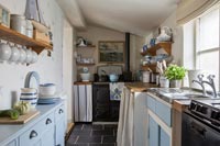 Galley kitchen in seaside cottage 