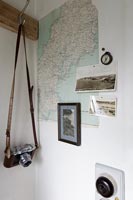 Map, photographs and vintage camera 