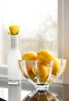 Lemons in glass bowl 