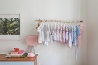 Homemade clothes rail for baby clothes 