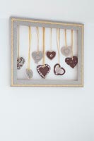 Frame filled with fabric hearts 