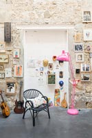 Large pink floor lamp and musical instruments in modern childrens room 