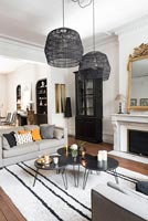 Modern monochrome living room with period details 