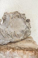 Carved stone welcome plaque 