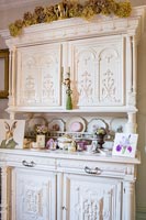 Ornate painted antique sideboard with carved doors 