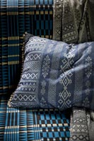 Close up blue patterned cushion 