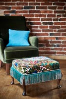 Cosy armchair and footstool 