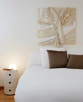 Fabric wall art in modern bedroom 