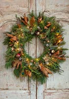 Christmas wreath on wooden doors 