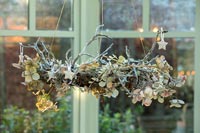Christmas garland made from twigs and hydrangea flowers 