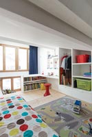 Colourful accessories in modern childrens room 