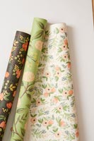 Rolls of various floral wallpaper 