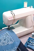 Sewing machines stitching handkerchiefs 