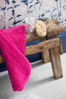 Rustic wooden stool with bathroom accessories 