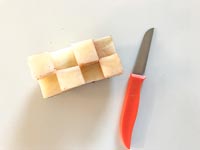 Checkered stamp and knife for decorating 