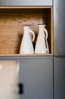 White coffee jugs in contemporary kitchen 