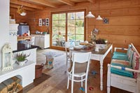 Open plan kitchen-diner in timber house 