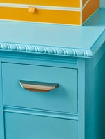 Turquoise chest of drawers with metal pull handle 