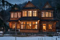 Country wooden villa at night 