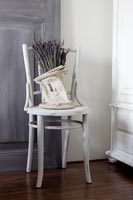 White distressed chair with lavender 